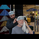 Ein Massar wird kunstvoll um die Kuma gewickelt